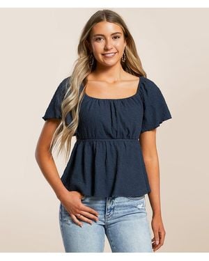 Daytrip Textured Back Tie Peplum Top - Blue