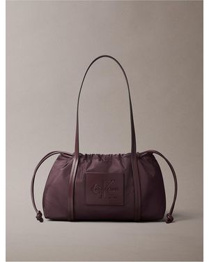 Calvin Klein Embossed Monologo Satchel Bag - Brown