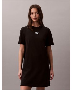 calvin klein black shirt dress SOLD Adolfo Black Knit Mod Dress With White Satin Collar & Cuffs 1970s –  Palm Beach Vintage main image 1