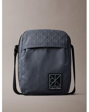Calvin Klein Allover Emblem Logo Jacquard Reporter Bag - Blue