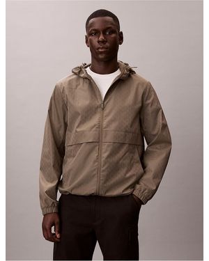 Calvin Klein Calvin Klein Allover Emblem Logo Windbreaker Jacket - Brown
