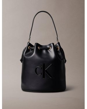 Calvin Klein Embossed Monogram Logo Bucket Bag - Black