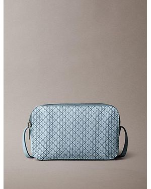 Calvin Klein Bolso cruzado con logo monograma en todo el artículo - Azul