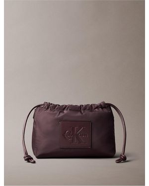 Calvin Klein Nylon Drawstring Monologo Crossbody Bag - Brown