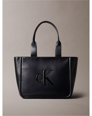 Calvin Klein Embossed Monogram Logo Tote Bag - Black