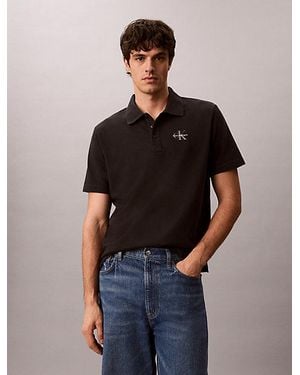 Calvin Klein Poloshirt Aus Baumwoll-Piqué Mit Monogramm - Schwarz