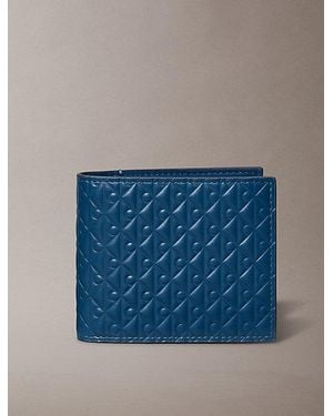 Calvin Klein Embossed Allover Monogram Bifold Wallet With Coin Pouch - Blue