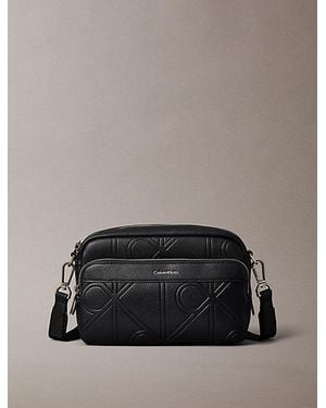 Calvin Klein Embossed Emblem Crossbody Camera Bag - Black