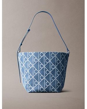 Calvin Klein Denim Allover Emblem Logo Bucket Bag - Blue
