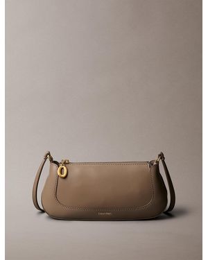 Calvin Klein Engraved Long Zip Crossbody Bag - Brown