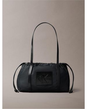 Calvin Klein Embossed Monologo Satchel Bag - Black