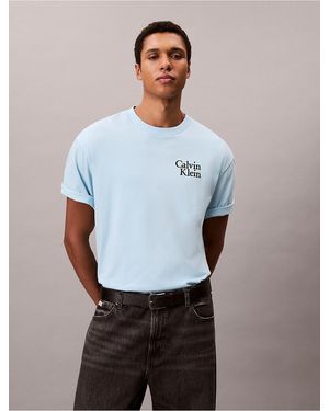 Calvin Klein Calvin Klein Resort Script Logo Graphic Relaxed T-Shirt - Blue