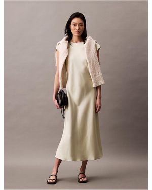 chinese dress ladies Calvin Klein Women's Flutter Sleeve A-Line Dress with Surplice Neckline,  Black/Cream, 2 at Amazon Women's Clothing store