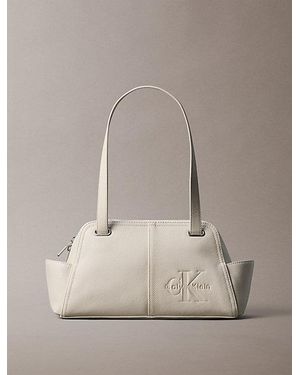 Calvin Klein Embossed Monologo Shoulder Bag - Natural