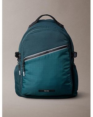 Calvin Klein Striped Utility Zip Round Backpack - Blue