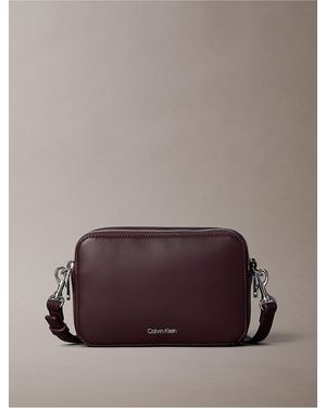 Calvin Klein Embossed Logo Crossbody Bag - Brown