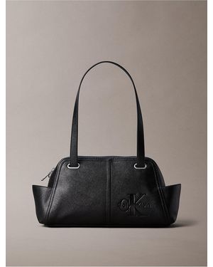 Calvin Klein Embossed Monologo Shoulder Bag - Black