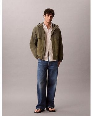 Calvin Klein Jeans Hooded Nylon Windbreaker Jacket - Blue