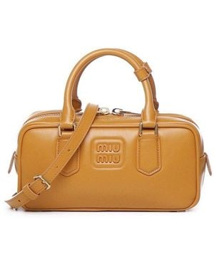 Miu Miu Logo Detailed Zipped Bowling Bag - Metallic
