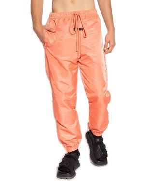 Fear of god red track pants deals
