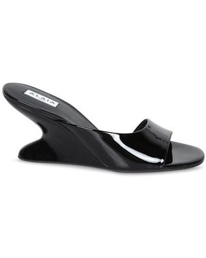 Alaïa High Shine Wedge Mules - Black