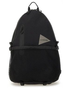and wander Logo Printed Backpack - Black