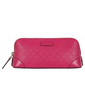 Gucci Embossed Logo Zipped Cosmetic Case - Pink