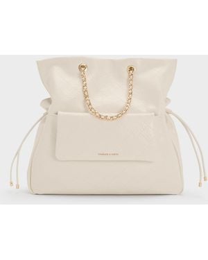 Charles & Keith Duo Quilted Drawstring Two-Way Backpack - Natural