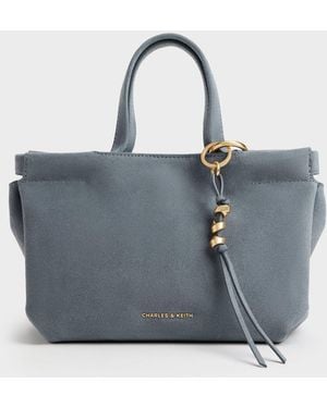 Charles & Keith Mini Zephyr Tassel Tote Bag - Blue