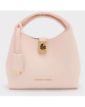 Charles & Keith Mini Chance Turn-Lock Bucket Bag - Pink