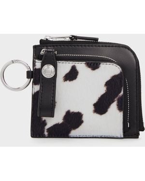 Charles & Keith Vega Furry Cow-Print Zip-Around Pouch - Black