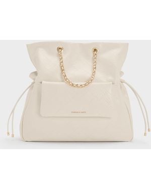 Charles & Keith Duo Quilted Drawstring Two-Way Backpack - Natural