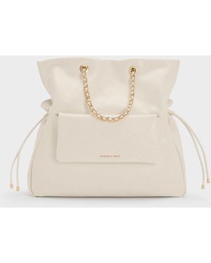 Charles & Keith Duo Quilted Drawstring Two-Way Backpack - Natural