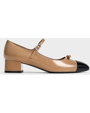 Charles & Keith Patent Bow Cap-Toe Mary Jane Pumps - Natural