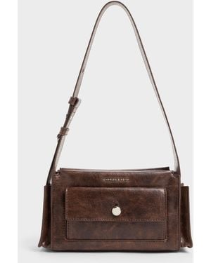 Charles & Keith Zevon Multi-Pocket Shoulder Bag - White