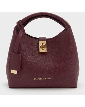 Charles & Keith Mini Chance Turn-Lock Bucket Bag - Purple