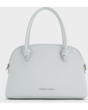 Charles & Keith Sammie Knotted-Handle Bowling Bag in Natural