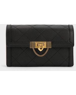 Charles & Keith Cressida Quilted Push-lock Clutch in Black