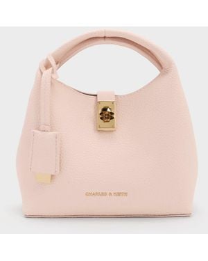 Charles & Keith Mini Chance Turn-Lock Bucket Bag - Pink