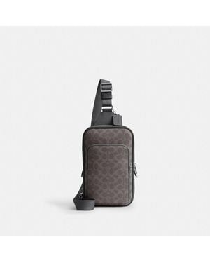 COACH Felix Sling Bag In Signature Canvas - Black