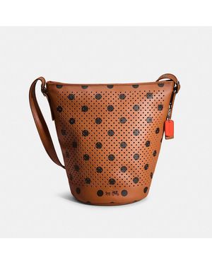 COACH Restored Duffle In Saddle Dot Perforated Leather - Brown