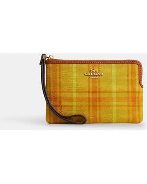 COACH Corner Zip Wristlet - Yellow