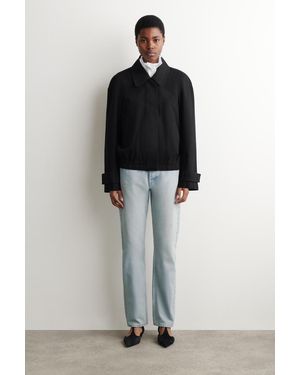 COS Pipeline Jeans Mit Schmalem Bein - Schwarz