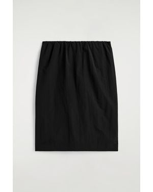 Jupe courte en laine mélangée Beige pour femme | Maje