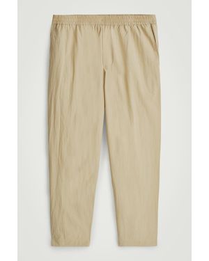 COS Elasticated Cotton Regular-Fit Tapered Trousers - Natural