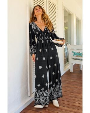 CUPSHE Geblümtes Langarm Jumpsuit Mit Tiefem Ausschnitt - Schwarz
