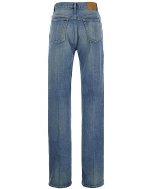 Saint Laurent Carrot-Fit Jeans With A Washed Effect in Black