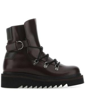 Ferragamo Borwn Solid Round Toe Boots - Black