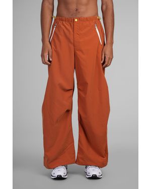 Nike Pantalone Parachute Pant in Nylon Arancione