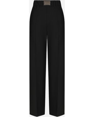 Dolce & Gabbana Ausgestellte Hose Aus Wolle Mit Logoplakette - Schwarz